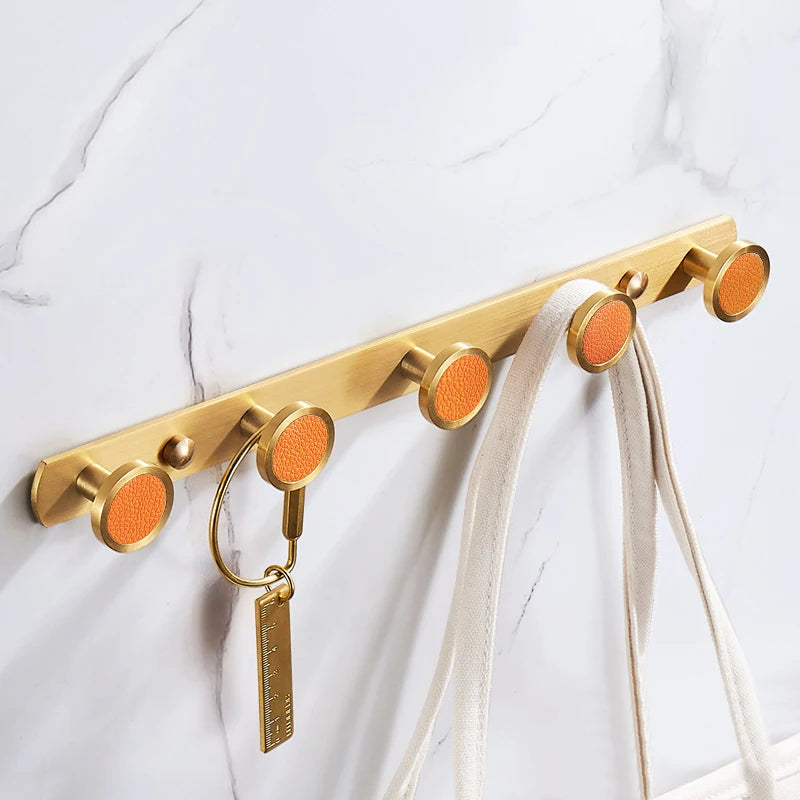 patère en laiton orange